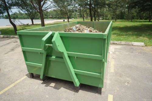 Waste clearance process in action at a Finsbury Park construction site